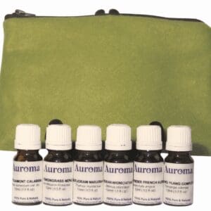 Six small bottles of essential oils on a green pouch.